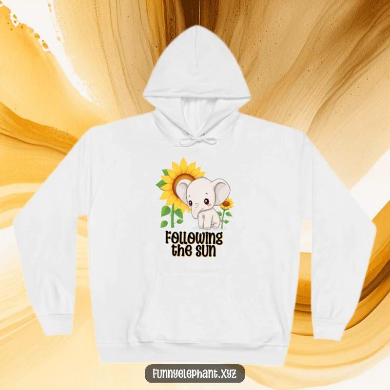 Funny hoodie: A delightful elephant with bright, curious eyes inspects a large, smiling sunflower with fascination.