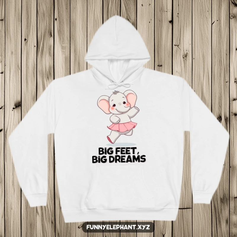Funny elephant in ballet attire comically attempting a graceful pose, emphasizing its large feet and humorous, happy demeanor on a cozy hoodie.