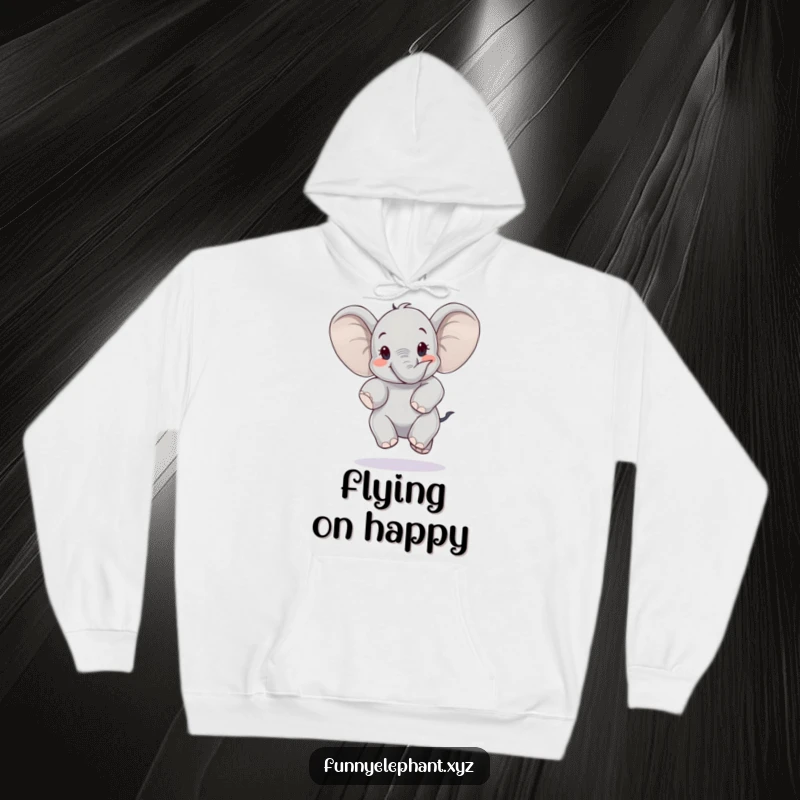 Happy elephant jumping with ears flapping like wings, featured on a cozy hoodie. Uplifting and funny apparel.