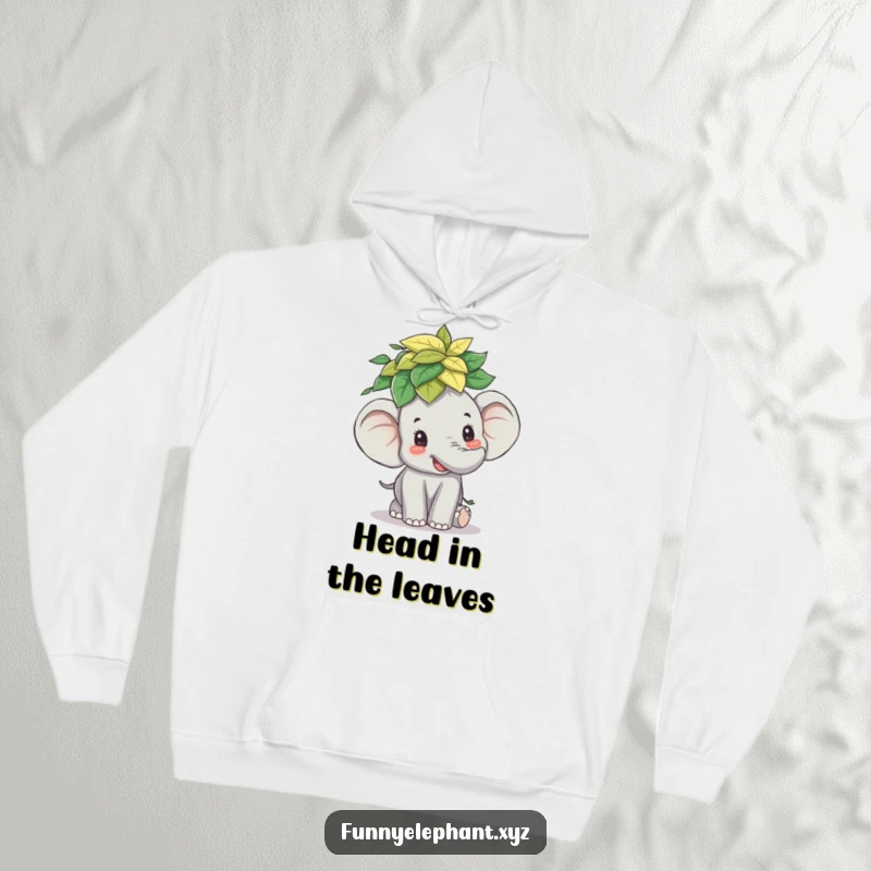 Funny hoodie: A delighted elephant with a joyful expression balances a tall stack of leaves effortlessly on its head.