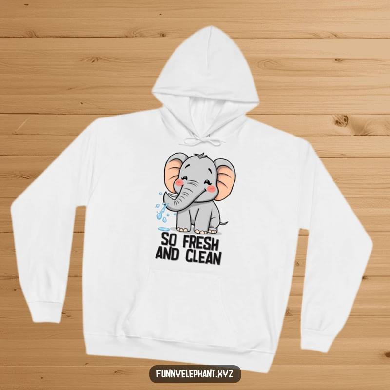 Funny hoodie: A happy elephant with a wide, infectious grin sprays water playfully from its trunk, exuding pure delight.